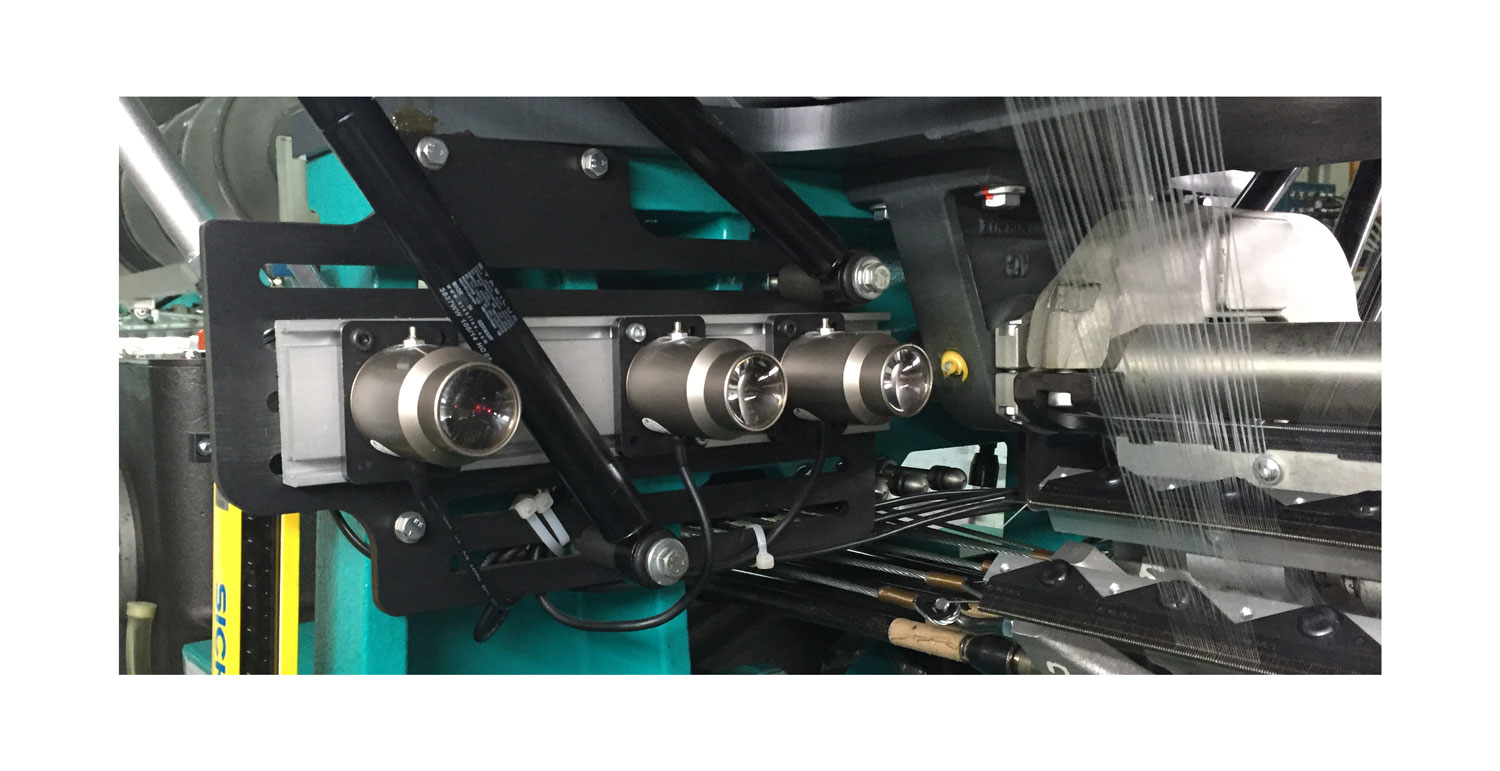 Laser Stop device in warp knitting machine